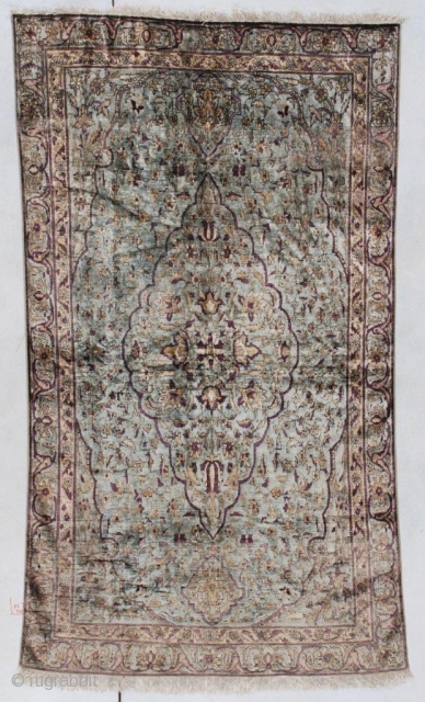 Silk Fereghan Antique Persian Rug #7536
This Silk Fereghan antique Persian Oriental carpet measures 3’6” X 6’6” (109 x 201 cm). It has a medium pale blue background with an overall floral design  ...