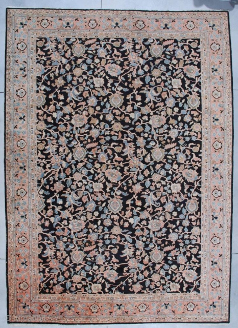 #7116 Antique Agra Rug from India 11’1′ x 15’3″

This third-quarter 19th-century Agra measures 11’1” x 15’3”. It has a black background with a vine and tendril design in   coral, very  ...