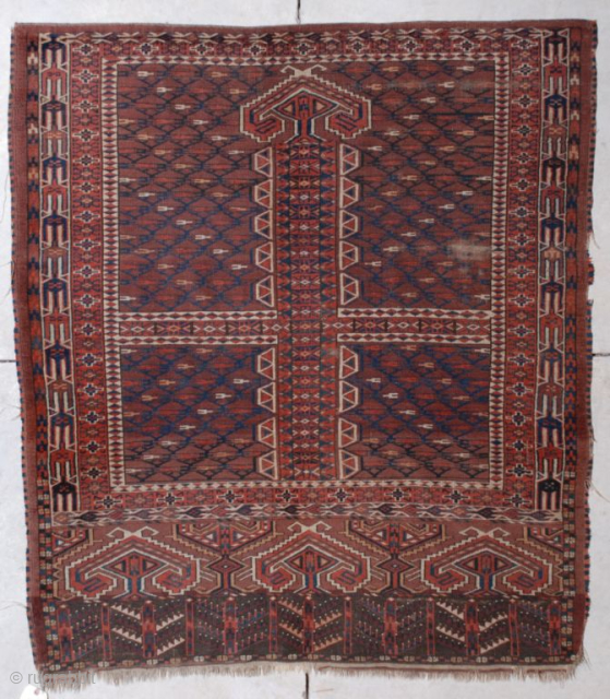This 2nd quarter 19th century Yomud Ensi Oriental Rug #6845 measures 4’8” x 5’2”. This is an excellent Ensi. The crossbar in the field is very low adding to the overall asymmetry  ...