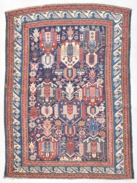 #7735 Kuba Antique Caucasian Rug 
This very antique Kuba rug measures 4’3” X 5’11” ( 131x 182 cm). As far as the putting an age on this rug, this could possibly be  ...
