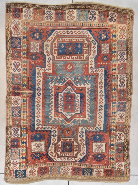 This circa 1860 antique Sewan Kazak Caucasian Oriental rug #7779 measures 5’8” X 8’0” (177 x 244 cm). It one or two generations older than the ones normally seen. It has a  ...