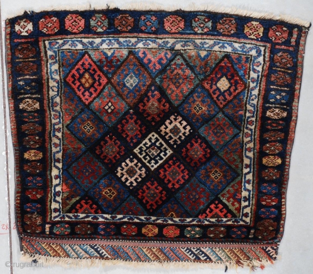 This last quarter 19th century antique Jaf Kurd Oriental Rug measures 2’8” X 3’0” (85 x 91 cm). It has a field filled with typical Jaf Kurd diamonds with a row of  ...