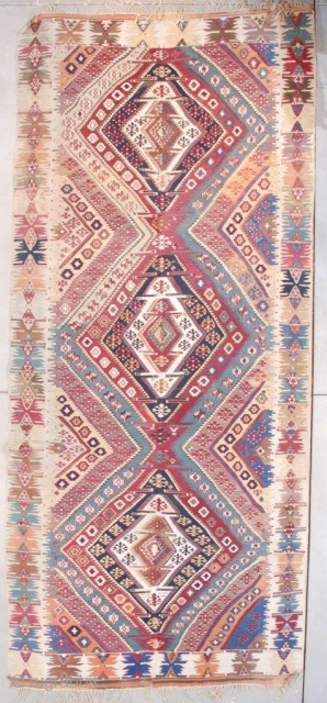 #7599 Antique Yoruk Kilim Rug 
This beautiful mid to early 19th century Yoruk Kilim measures 5’10” x 13’4” (180 x 408 cm). It is woven as usual in two panels and put  ...