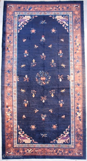 #7664 Antique Peking Chinese Oriental Rug
This circa 1890 Peking Chinese rug measures 9’10” x 18’10” (304 x 576 cm). It has a beautiful blue field with scattered iconography of peonies, butterflies, vases  ...