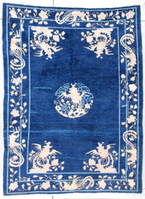 #7328 Peking Chinese Rug

This late 19th century Peking Chinese Oriental Rug measures 6’4” X 8’5”. It has a dark blue variegated field with a corner motif of phoenix birds perched in a  ...