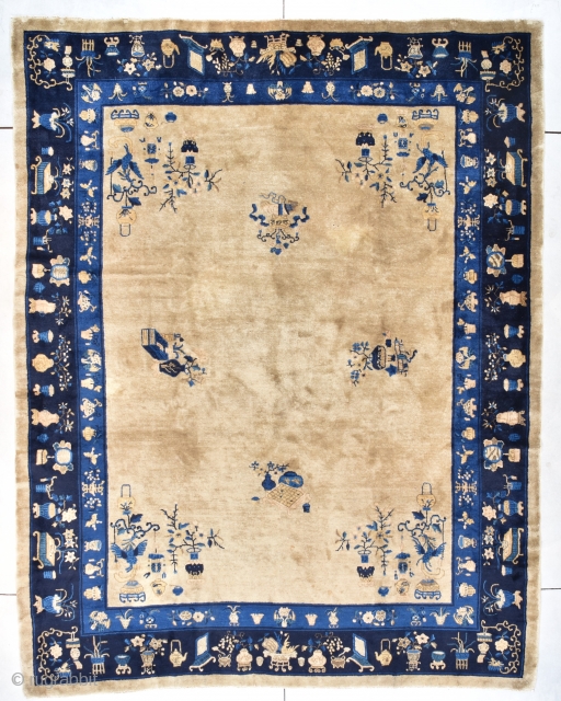 #7726 Antique Peking Chinese Rug 
This circa 1900 Antique Peking Chinese Oriental Rug measures 9’2” x 11’7” (280 x 356 cm). It has a very nice café au lait field with scattered  ...