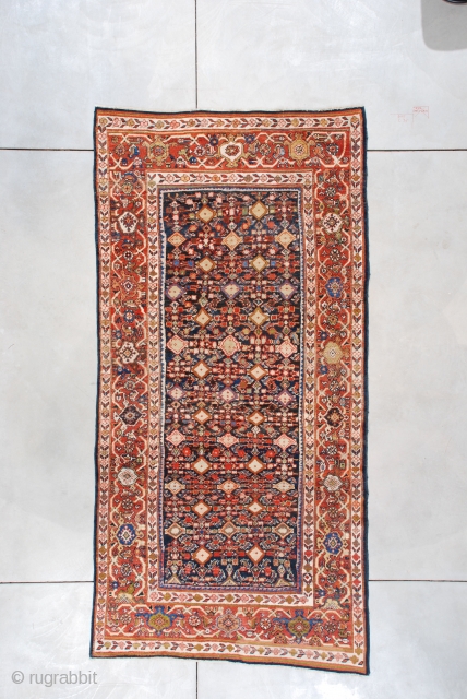 #7451 Mahal

This 1st quarter 20th century Mahal measures 5’0” X 10’2” (152 x 310 cm). The field motif is a very complicated Herati design on a blue ground. The complication comes in  ...