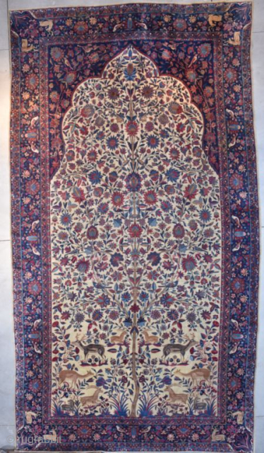This OVERSIZED circa 1910 Laver Kerman/Yazd #8152 Oriental Carpet measures 9’8” X 17’8”. It has a one way design in a prayer motif. The ivory ground design has a tree of life  ...