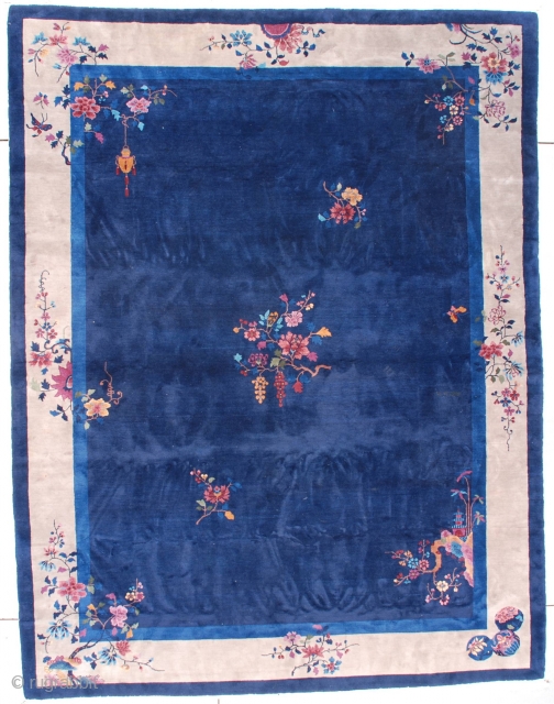 #7539 Art Deco Chinese Oriental Rug

This circa 1920 Art Deco Chinese Oriental Rug measures 9’0” X 11’9” (274 x 362 cm). It has a navy blue field containing a floral motif consisting  ...