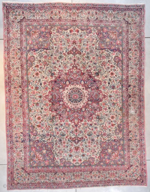 #7686 antique Laver Kerman Rug

This circa 1920 Laver Kerman antique Persian rug measures 9’0” X 12’0” (274 x 372 cm). It has a large pulled medallion in pale red with an ivory  ...