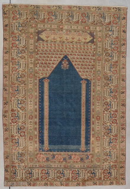#7791 Ghiordes Antique Turkish Carpet This circa 1800 Ghiordes antique Turkish Oriental Rug measures 3’9” X 5’7” (117 x 174 cm). I am dating this rug at 1800 but there are images  ...