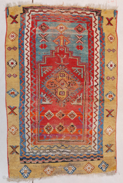This very antique possibly circa 18c? Konya #7399 measures 3’11” X 4’10” (120 x 150 cm). This rug is all things Konya. It has a Turkish madder red field with prayer design  ...