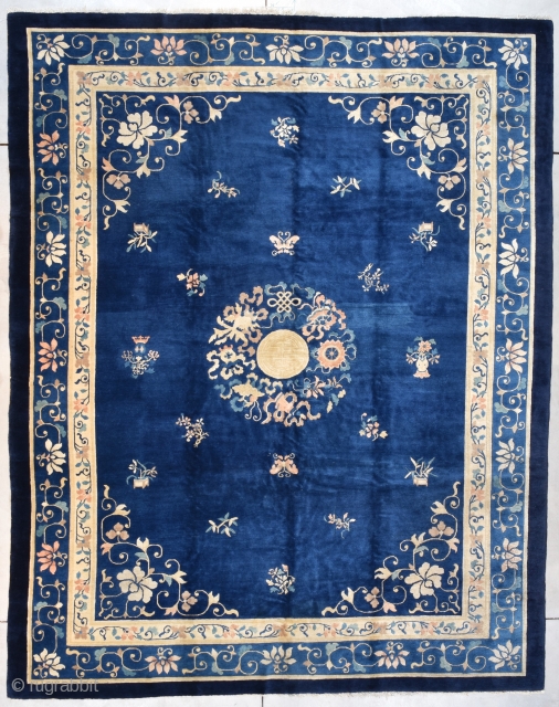#7721 Peking Chinese Rug

This circa 1900 Peking Chinese antique Oriental Rug measures 9’3” X 11’8” (283 x 359 cm). It has a dark blue field with a center medallion composed of Shou  ...