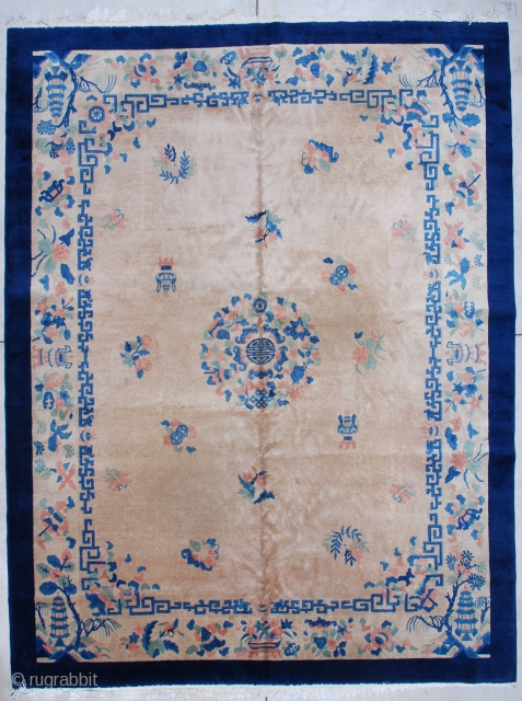 #7292 Art Deco Chinese Rug

This circa 1930 Art Deco Chinese Oriental rug measures 9’0” X 11’8”. It has a light café au lait field with a center medallion containing the symbol for  ...