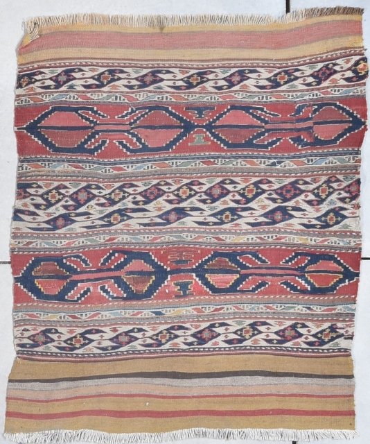 This end of the 19th century Shirvan Kilim rug measures 2’9” X 3’4”. It has red and white stripes. The ivory stripes are woven in Sumac motif. The red stripes are kilim.  ...