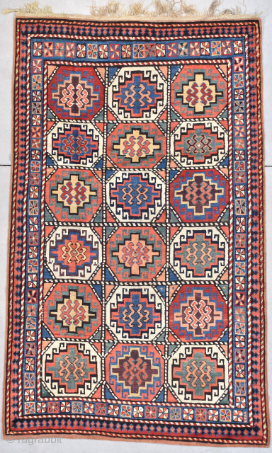 This circa 1875 Mogan #7894 measures 4’2” X 6’10”. It has 18 Memling guls in six rows of three. There is a lot of color in this rug. Red and green on  ...