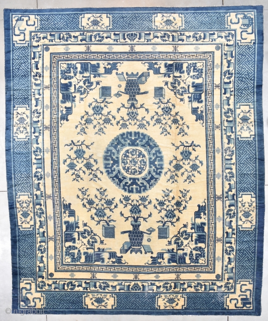 #6492 Antique Peking Chinese Rug
This 19th century Peking Chinese rug measures 11’4” x 13’7”. It has a center medallion in three shades of blue with rose encircling a smaller center medallion with  ...