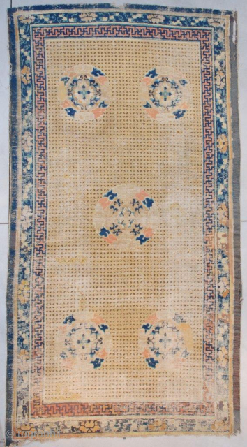 This Very Antique Ningxia Chinese Rug circa 1650 #7588 measures 6’5” x 12’5” (195 x 378 cm). It is the so called ‘Rice’ design motif on a yellow to wheat colored ground.  ...