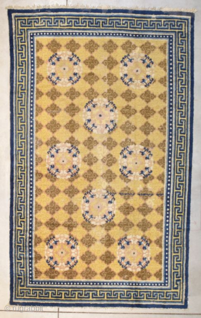 This second quarter 19th century Ningxia Chinese Oriental rug #8226 measures 4 foot 7 inches by 7 foot 4 inches. It has a yellow field with medium brown colored stylized flower heads  ...