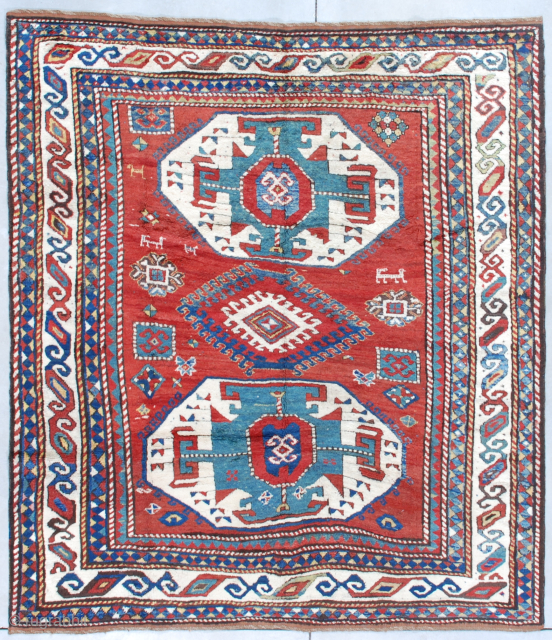 This circa 1880 Lori Pambak Kazak measures 6’5” X 7’2” (198 x 219 cm). It is a full pile beauty with the typical Lori Pambak medallion layout. It has one large ivory  ...