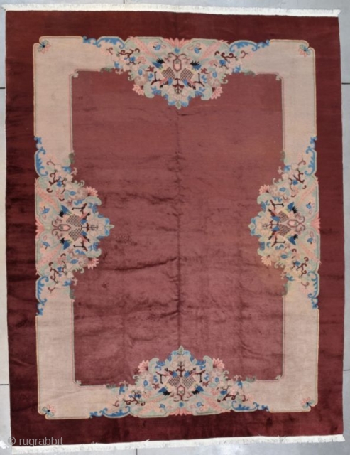 This circa 1930 Art Deco Chinese oriental Rug measures 9’3” X 11’9” (283 x 362 cm). The motif is an open field in coppery brown with a wide light border at each  ...