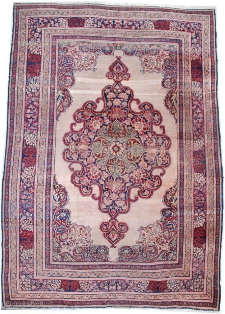 # 7072 Antique Kermanshah Persian Rug
This circa 1880 antique Kermanshah Persian Oriental Carpet measures 9’2″ x 12’10”. It has a beautifully drawn large pulled medallion in pale green, cherry and navy blue  ...