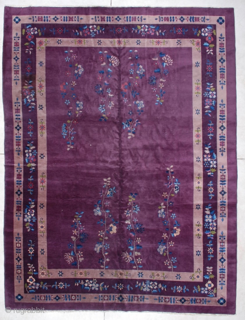 #6144 Antique Art Deco Chinese 
This circa 1930 vintage Art Deco Chinese Oriental carpet measures 8’9” X 11’8”. It has a field design of four flowering vines coming up from each end  ...