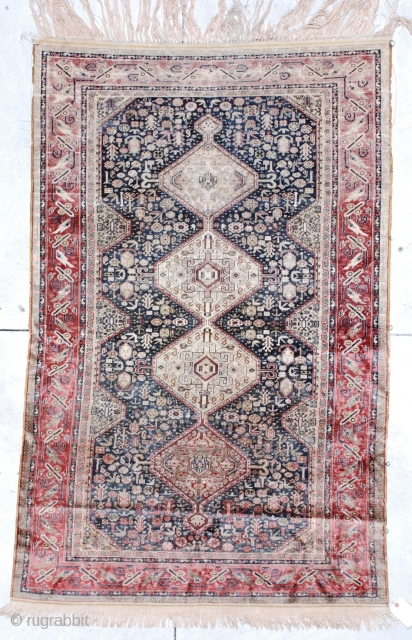 #6448 Antique Kayseri Turkish Rug
This circa 1900 Keyseri measures 4’0” X 6’2”. It has a Qashqai design with a dark blue field with four medallions, two red and two ivory. , on  ...