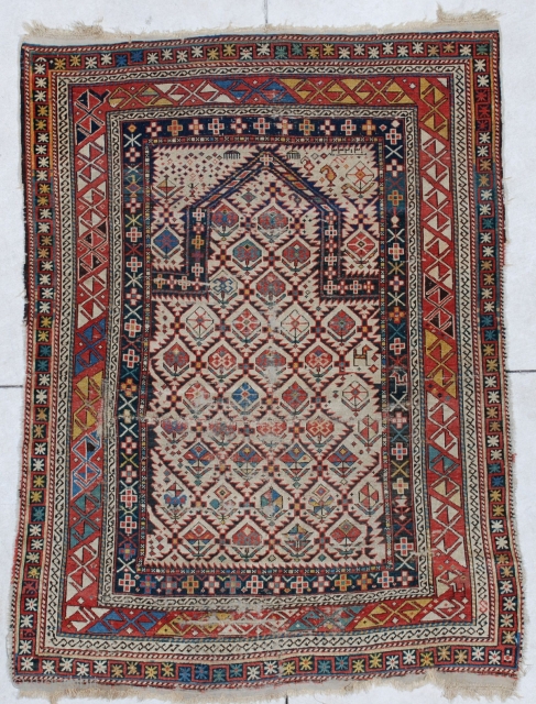 #6611 Shirvan Antique Caucasian Rug 
This antique Shirvan Oriental area rug dated 1818 measures 3’6” X 4’10”. It is an extremely early dated Shirvan prayer rug. It has an ivory field with  ...