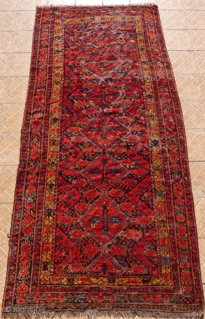 Ersari Beshir Main Carpet,10.8 x 4.9ft. (330 x 150 cm) circa 1880 Classic design with six linked medallions on a mixed blue   and dark brown ground.  Main border with  ...