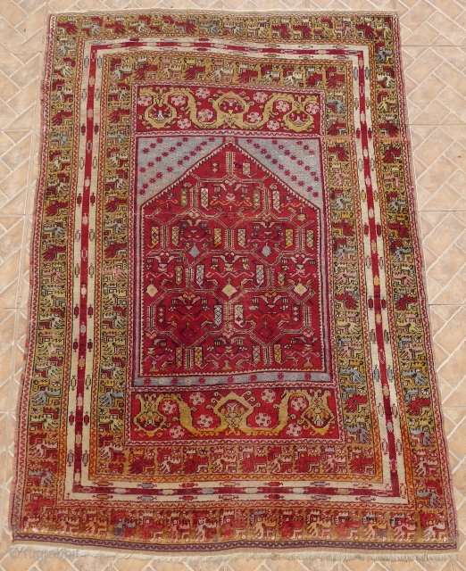 Antique Kirshehir prayer rug, central Anatolian, 192 cm. x 136 cm. Typical ethereal, light blue ground colour. The pink, however, is probably synthetic, which is often the case in rugs of this  ...