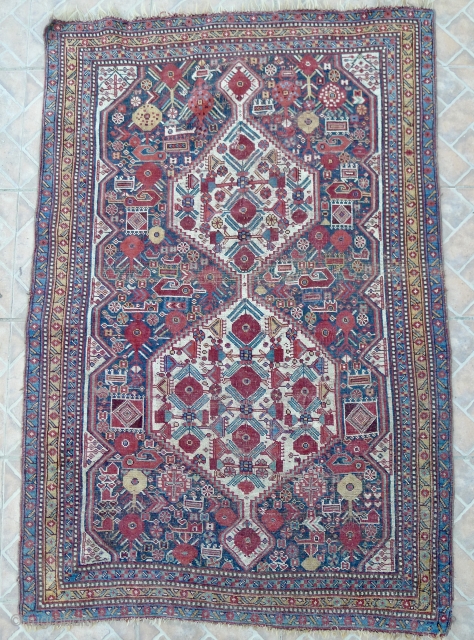 Qashqai Rug 3.4 ft. x 5.1ft. (104 x 156 cm) late 19 th. century Twin medallion type with poppy flowers and other floral motifs. tight weave. Fabulous colours: cherry red, mustard yellow,  ...