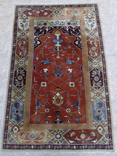 An Ottoman style' single-niche' Transylvanian Rug, originally from western Anatolia, 17 th. century.  Presently sparsely reproduced in the Konya region workshops in the mid 20 th. century. This example with a  ...