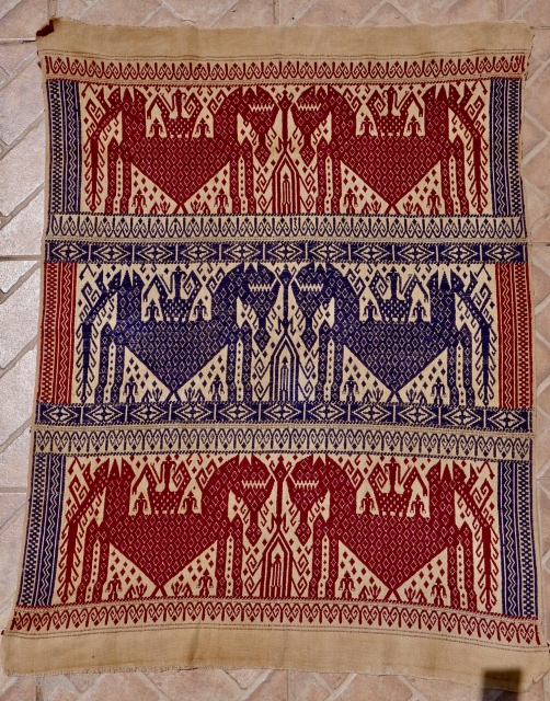 An antique ship cloth (Tampan) 70 x 93 cm. 19 th. century
Woven on cotton by tribal Paminggir people, Lampung, South Sumatra. The design with triple rows of ships in the shape of  ...