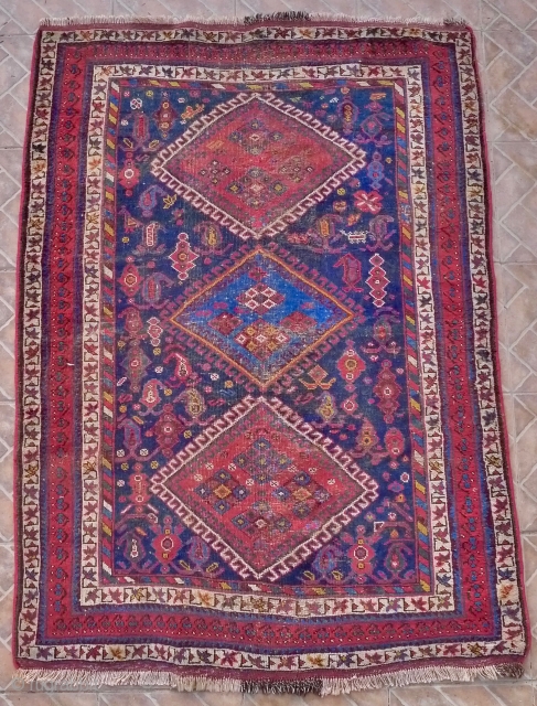 Afshar Rug, 5.5ft x 3.9ft (170 cm x 120 cm.) late 19 th. century. Sirjan area, possibly Bolvard village. The dark blue ground with three large diamond shaped lozenges, surrounded by   ...