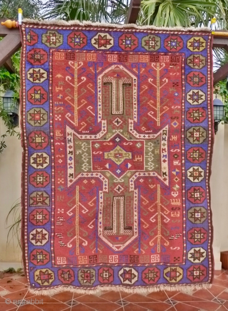 Sewan Kazak, Bordjalou region, 180 x 130cm. (5.9ft x 4.25ft) ca. 1900. The design with a large  mint-green cruciform medallion on a brick-red ground. The main border with a row of  ...