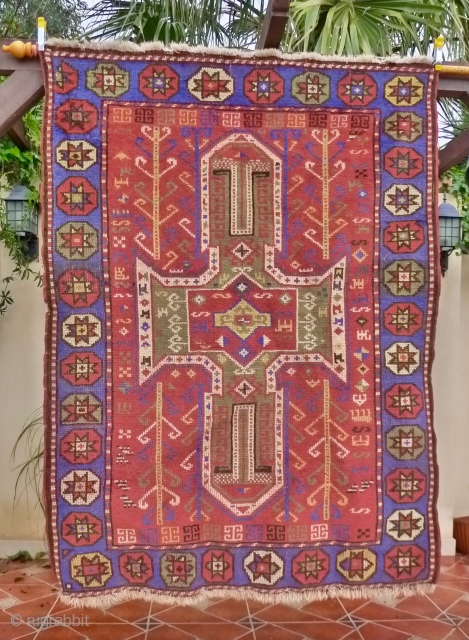 Sewan Kazak, Bordjalou region, 180 x 130cm. (5.9ft x 4.25ft) ca. 1900. The design with a large  mint-green cruciform medallion on a brick-red ground. The main border with a row of  ...