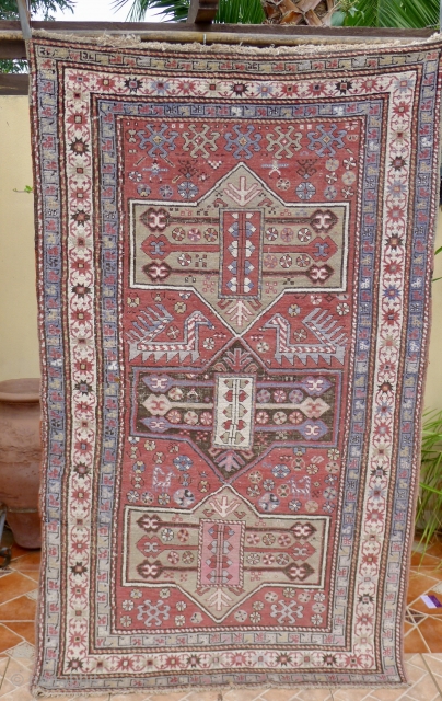 Antique Gendje rug, 6.7ft x 3.8ft. around 1910. Three octagonal medallion type, surrounded by flowerheads and two Akstafa peacocks. Nice mellow pistache geen medallions. However, the pink and a faded purple blue  ...