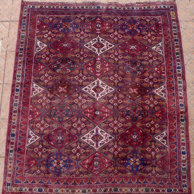 Afshar Rug, Sirjan region, 185 x 160 cm. (6ft x 5.25ft) early 20 th. century. All over lozenges-grid design.
Good condition with some corrosion of the dark brown colour.
Ref: Parviz Tanavoli, plate 24
$360  ...