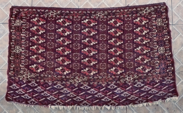 Tekke Chuval, 115 x 70 cm. late 19 th. century. The design with 5 x 6 rows of chuval guls. Very fine weave with about 5,400 knots per sq. dm. (83,700 KPSI,  ...