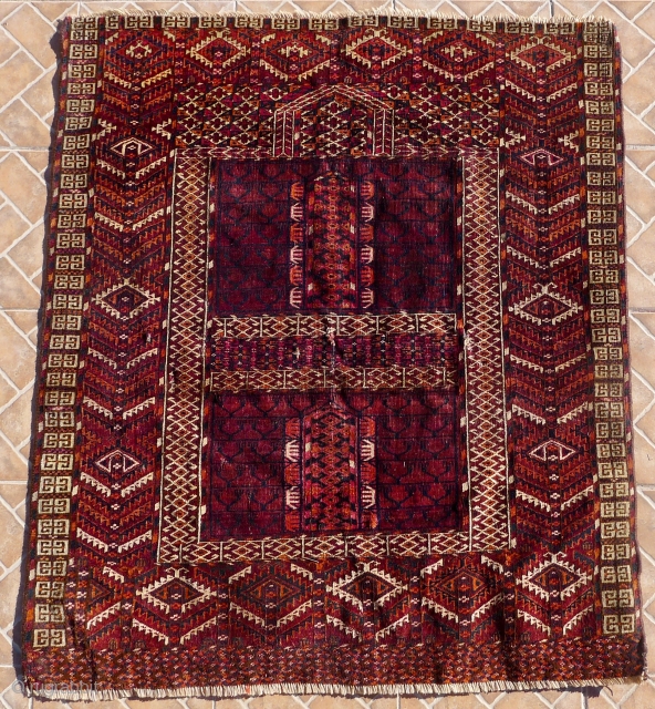 Tekke Ensi (Yurt entrance rug) 133 x 113 cm (4.4 x 3.7ft) 3rd. qrt 19 th. Century.
Good colours with some nice saffron yellow, sparsely used in the elim side.
In general good condition  ...