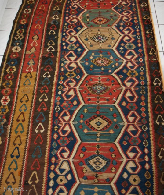 Antique Caucasian Kilim Fragment

Antique Caucasian kilim - Kelim fragment featuring traditional geometric motifs and vibrant colors. Shows signs of age with small holes and wear.

Size: 198 × 137 cm
    