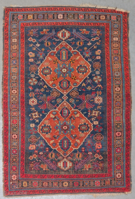 Caucasian Kuba rug with bird motifs, late 19th century – border wear, small hole near a corner – 180 × 124 cm.           