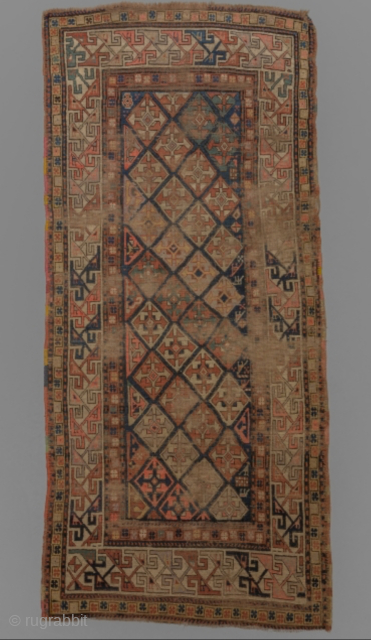 Caucasian Shirvan Rug – Worn/Distressed Condition – 241 × 106 cm
Beautiful antique Shirvan rug with classic geometric motifs and a naturally aged, distressed look.