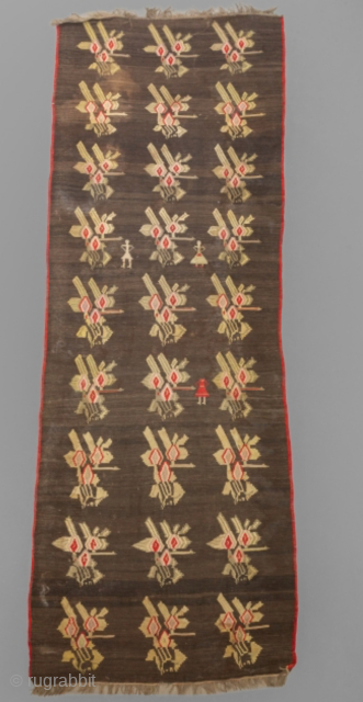 Dark Grey Caucasian Karabakh Kilim with Female Figures – 407 × 153 cm
Striking vintage Karabakh kilim featuring bold geometric motifs and rare woven female figures.        