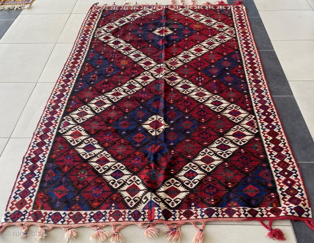 Van - Hakkari Gulsar Kilim
Made of handspon wool by Hartushi (Subtribe Jirka) in the First Quarter of 20th Century. Size is 175 x 245 cm. Woven on the horizontal loom as two  ...
