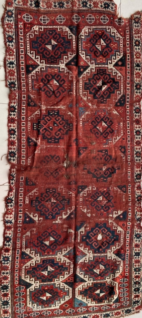Caucasian Rug with extremely poor condition. This distressed rug most probably belongs to the First Half of 19th Century.Some areas are extremely torn and with holes yet some gul motifs remain untouched.  ...