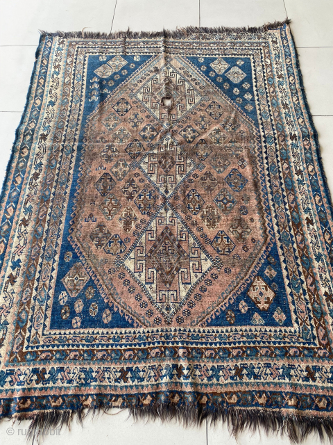 Very old Qashqai rug with goathair foundation. Circa 1900s maybe older. Size is 155 x 215 cm. There is a hole in the field of the rug and ends are worn. Contact: ...