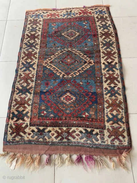 A finely woven tribal rug from Persian Kurdistan, likely from the Kolyai or Sanjabi weaving tradition in the Jaf-Kurdish style. The palette is rich with age-appropriate depth: indigo blues with natural abrash. ...