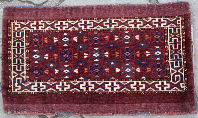 A most unusual colorful mint condition Yomud Mafrash retaining its original back with deeply corroded raspberry red insect dyed highlights, wefting consisting of twisted very fine wool and cotton strands, 19th. century,  ...